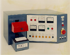 Domestic electric socket test machine.  A series of electrical and safety tests are performed.